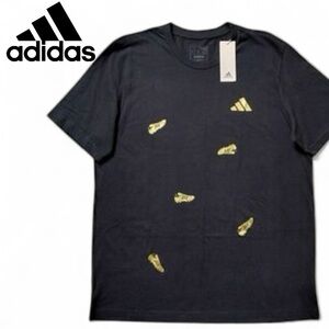 Adidas Men's Black Tee with Yellow Soccer Cleats. NEW